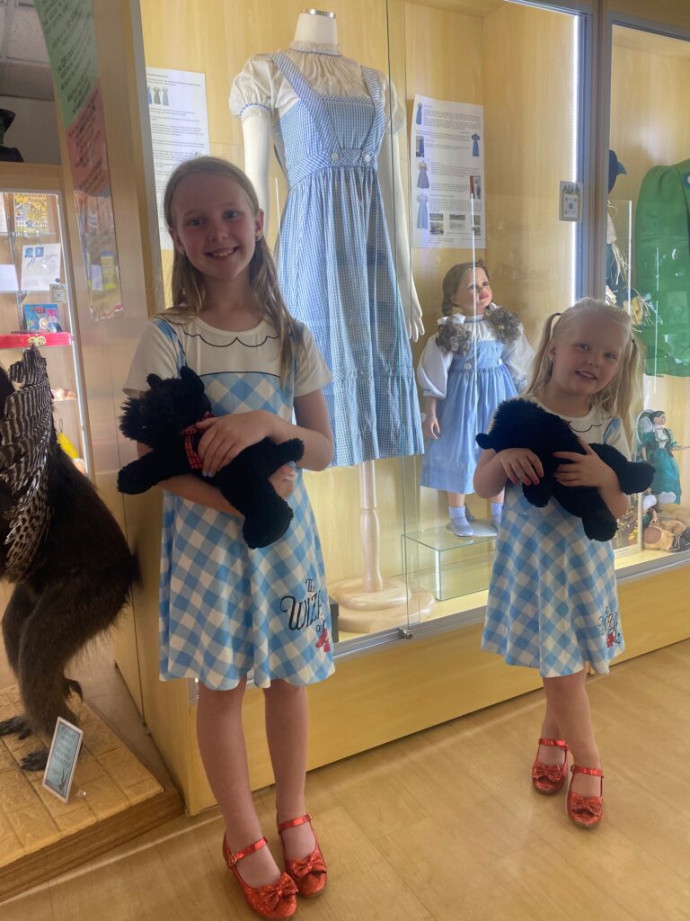 Kids by Wizard of Oz dresses at the museum in Cape Canaveral